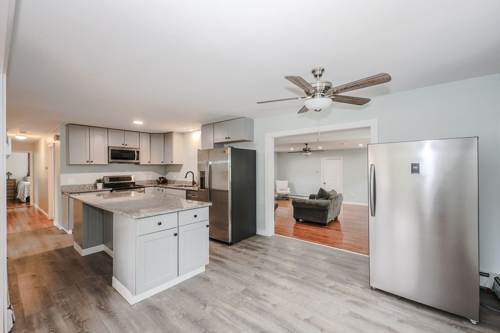 Interior, Kitchen, Living room, Recessed Lighting, Stainless Steel Appliances, Wood Texture Flooring