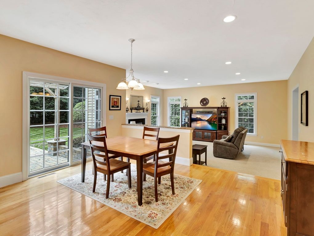 Dining room, Fireplace, Interior, Living room, Pendant Lights, Recessed Lighting, Wood Texture Flooring