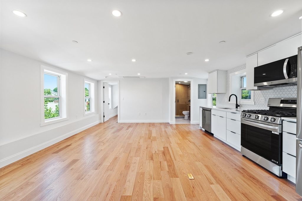 Interior, Kitchen, Recessed Lighting, Stainless Steel Appliances, Wood Texture Flooring