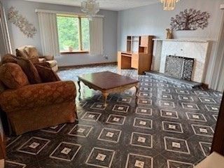 Chandelier, Fireplace, Interior, Living room