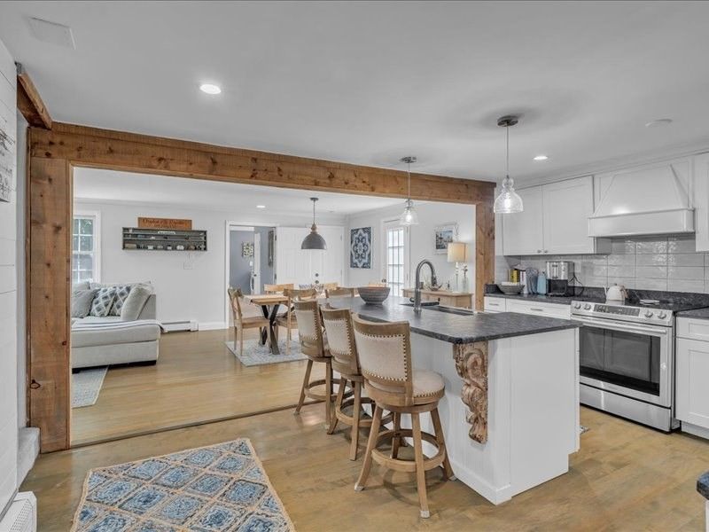 Dining room, Interior, Kitchen, Living room, Pendant Lights, Recessed Lighting, Stainless Steel Appliances, Wood Texture Flooring