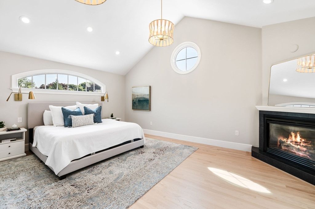 Bedroom, Fireplace, Interior, Pendant Lights, Recessed Lighting, Wood Texture Flooring