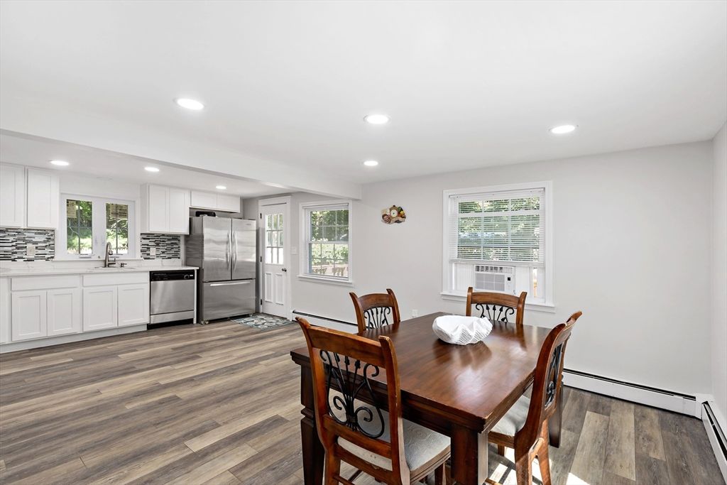 Dining room, Interior, Kitchen, Recessed Lighting, Stainless Steel Appliances, Wood Texture Flooring
