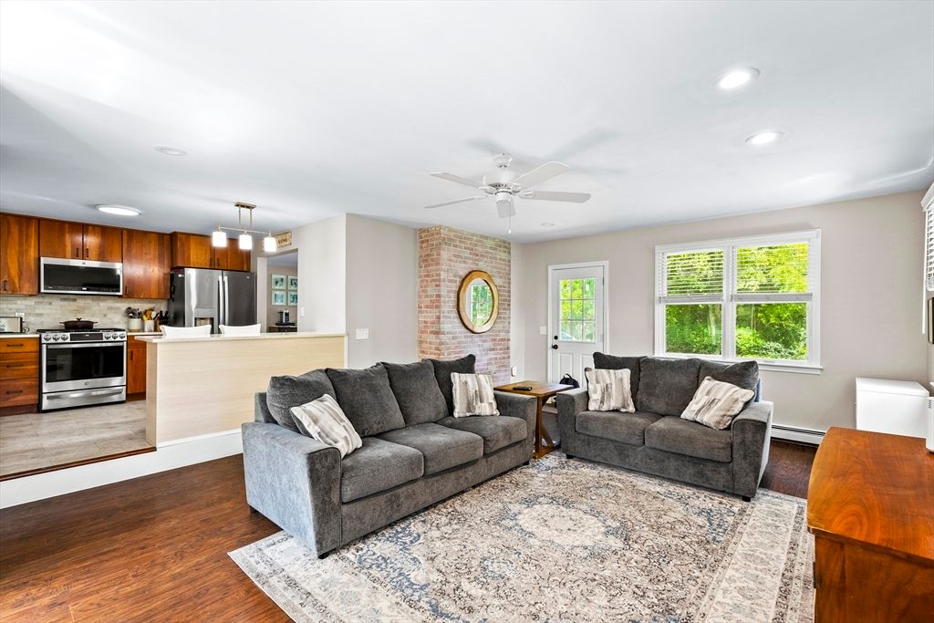 Interior, Kitchen, Living room, Pendant Lights, Recessed Lighting, Stainless Steel Appliances, Stone Walls, Wood Texture Flooring