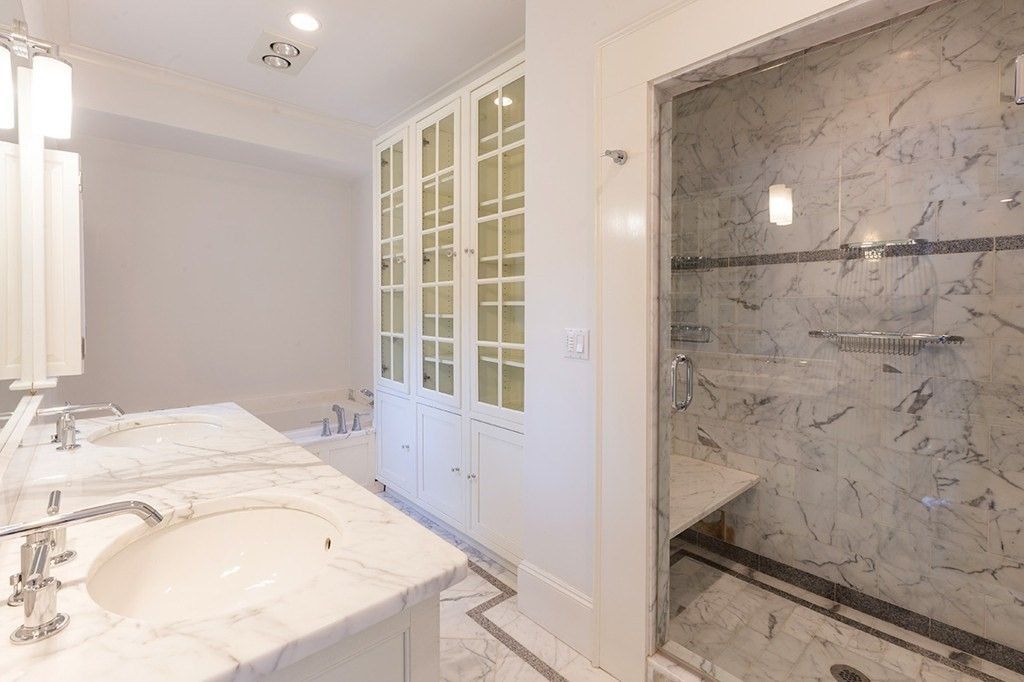 Bathroom, Dual Sink Vanities, Glass Shower, Interior, Marble, Marble Walls, Recessed Lighting