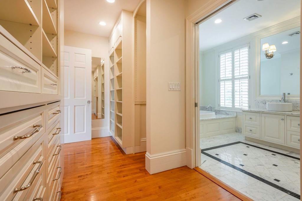 Bathroom, Dual Sink Vanities, Interior, Marble, Recessed Lighting, Walk-in Closets, Wood Texture Flooring