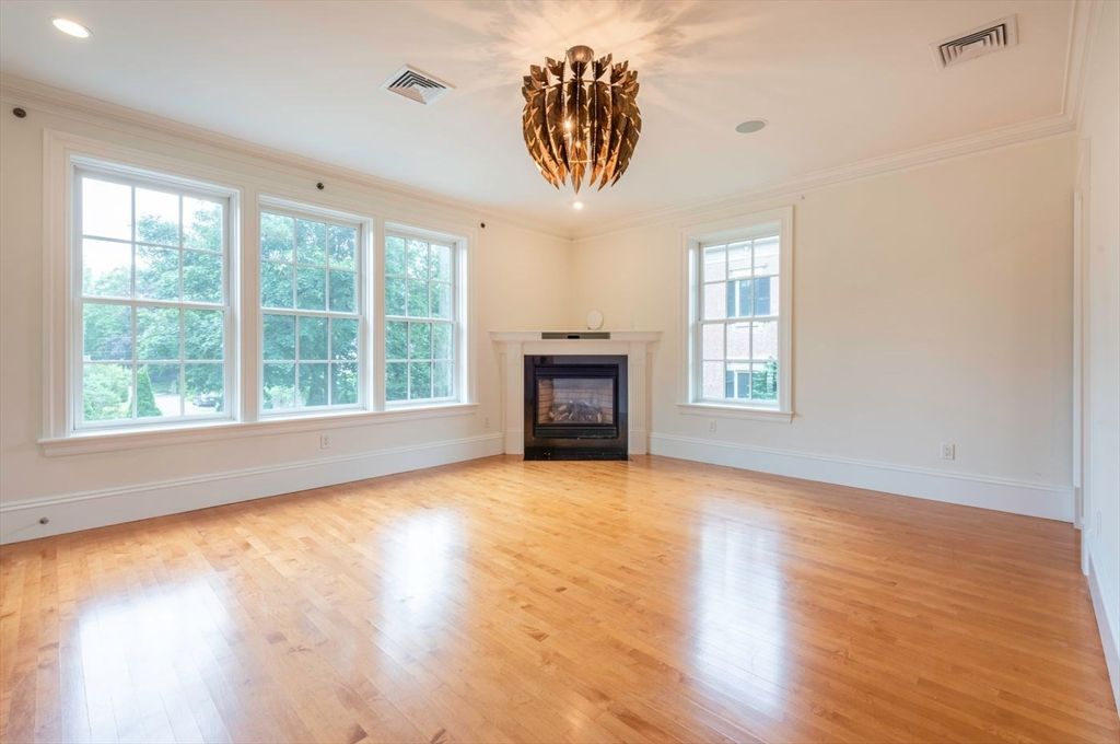 Chandelier, Empty room, Fireplace, Interior, Recessed Lighting, Wood Texture Flooring