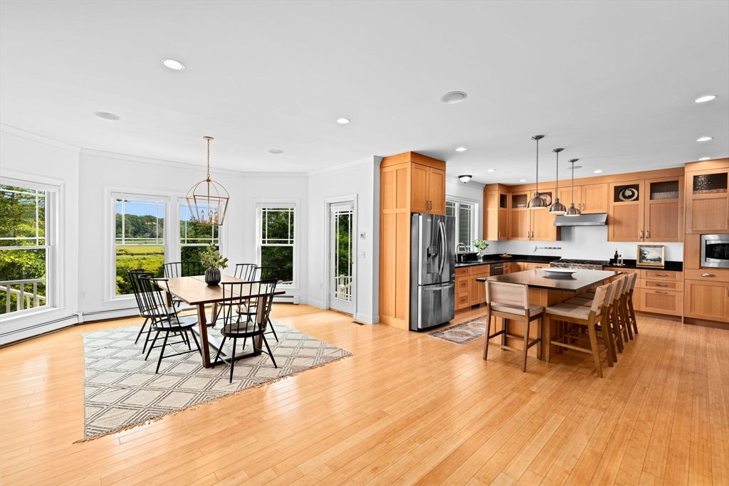Dining room, Interior, Kitchen, Pendant Lights, Recessed Lighting, Stainless Steel Appliances, Wood Texture Flooring