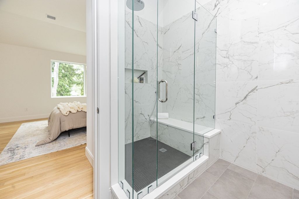 Bathroom, Glass Shower, Interior, Marble Walls, Wood Texture Flooring