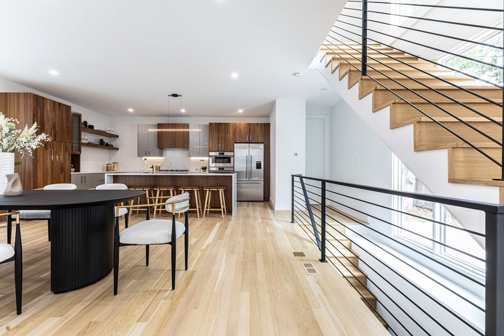 Dining room, Interior, Kitchen, Pendant Lights, Recessed Lighting, Stainless Steel Appliances, Wood Texture Flooring
