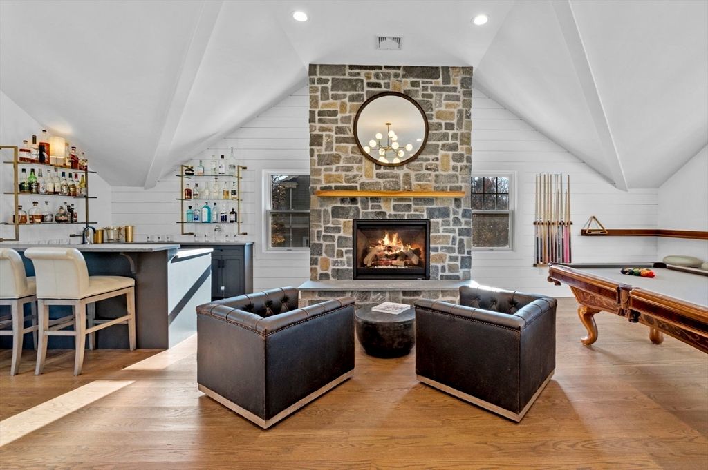 Billiard Table, Fireplace, Game Room, Interior, Living room, Recessed Lighting, Stone Walls, Wood Texture Flooring
