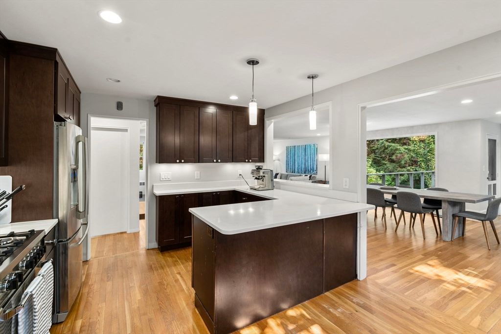 Dining room, Interior, Kitchen, Pendant Lights, Recessed Lighting, Stainless Steel Appliances, Wood Texture Flooring