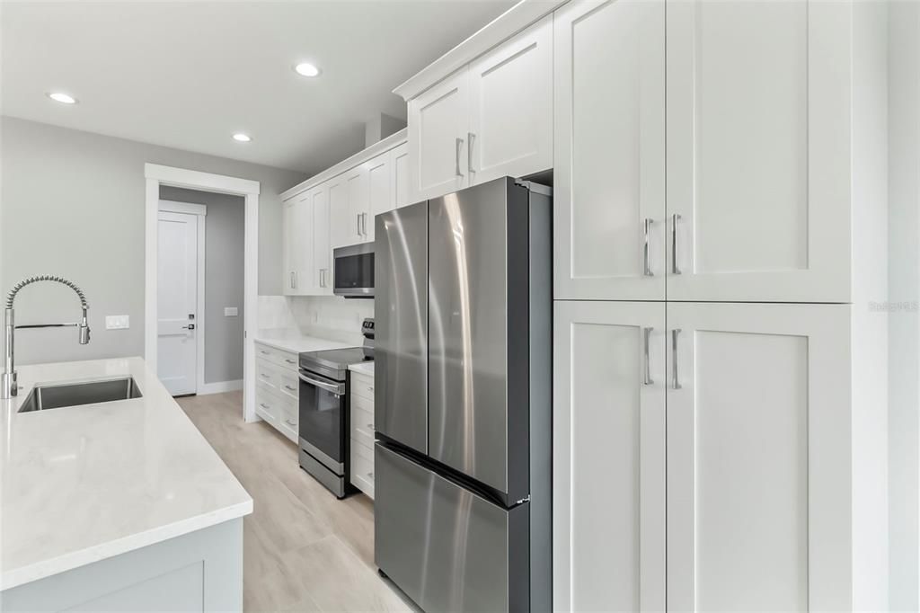 Interior, Kitchen, Recessed Lighting, Stainless Steel Appliances, Wood Texture Flooring