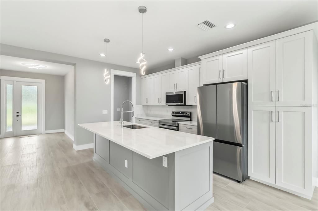 Interior, Kitchen, Pendant Lights, Recessed Lighting, Stainless Steel Appliances, Wood Texture Flooring