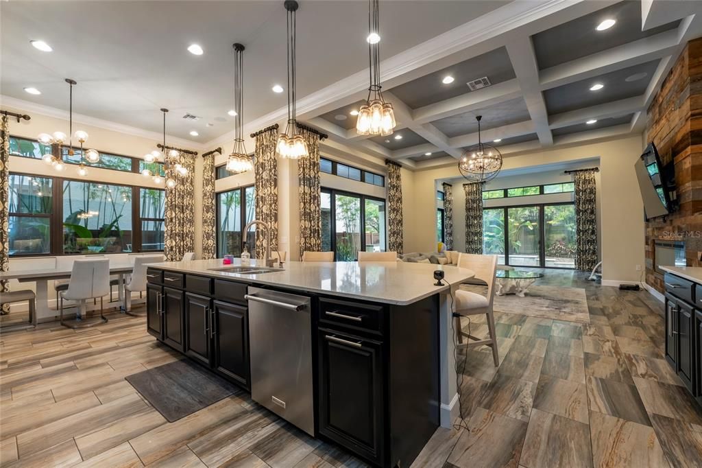 Chandelier, Dining room, Interior, Kitchen, Pendant Lights, Recessed Lighting, Stainless Steel Appliances, Wood Texture Flooring