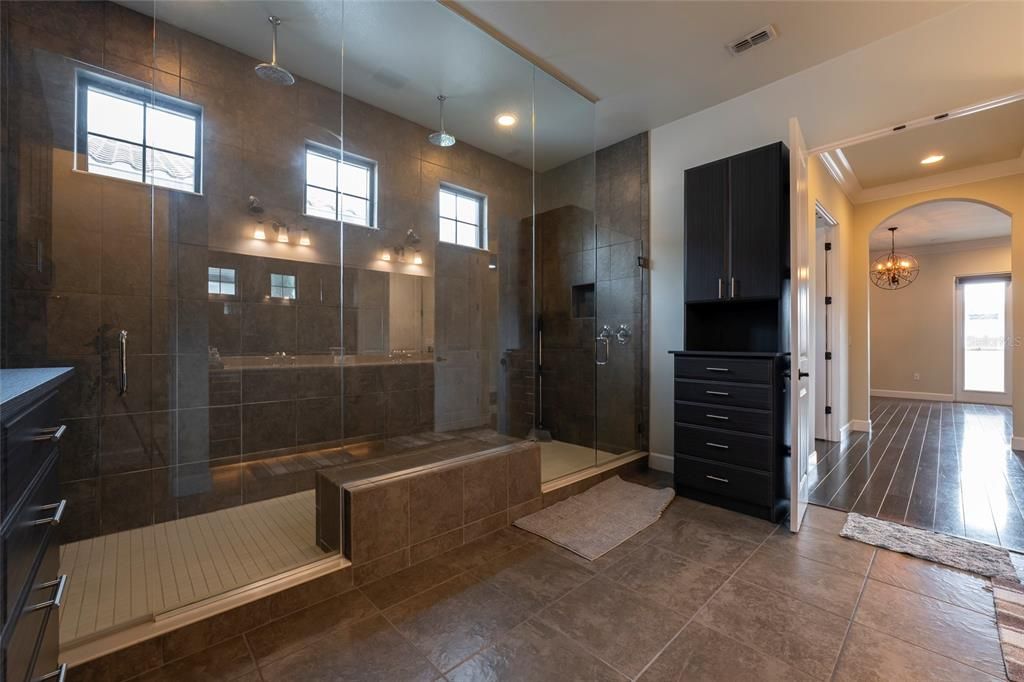 Bathroom, Chandelier, Glass Shower, Interior, Pendant Lights, Recessed Lighting, Wood Texture Flooring