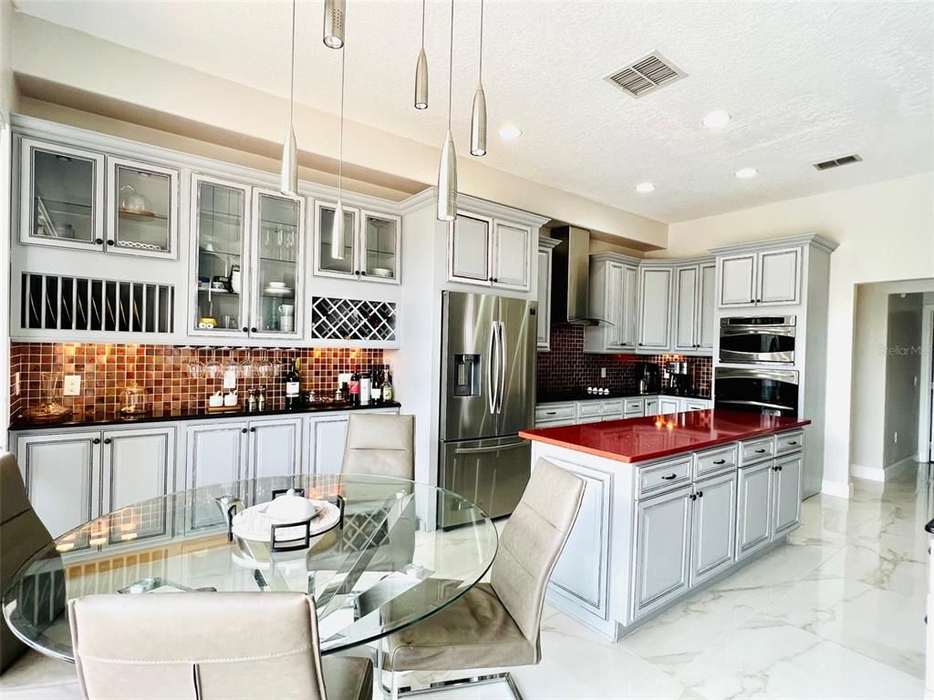 Dining room, Interior, Kitchen, Marble, Pendant Lights, Recessed Lighting, Stainless Steel Appliances