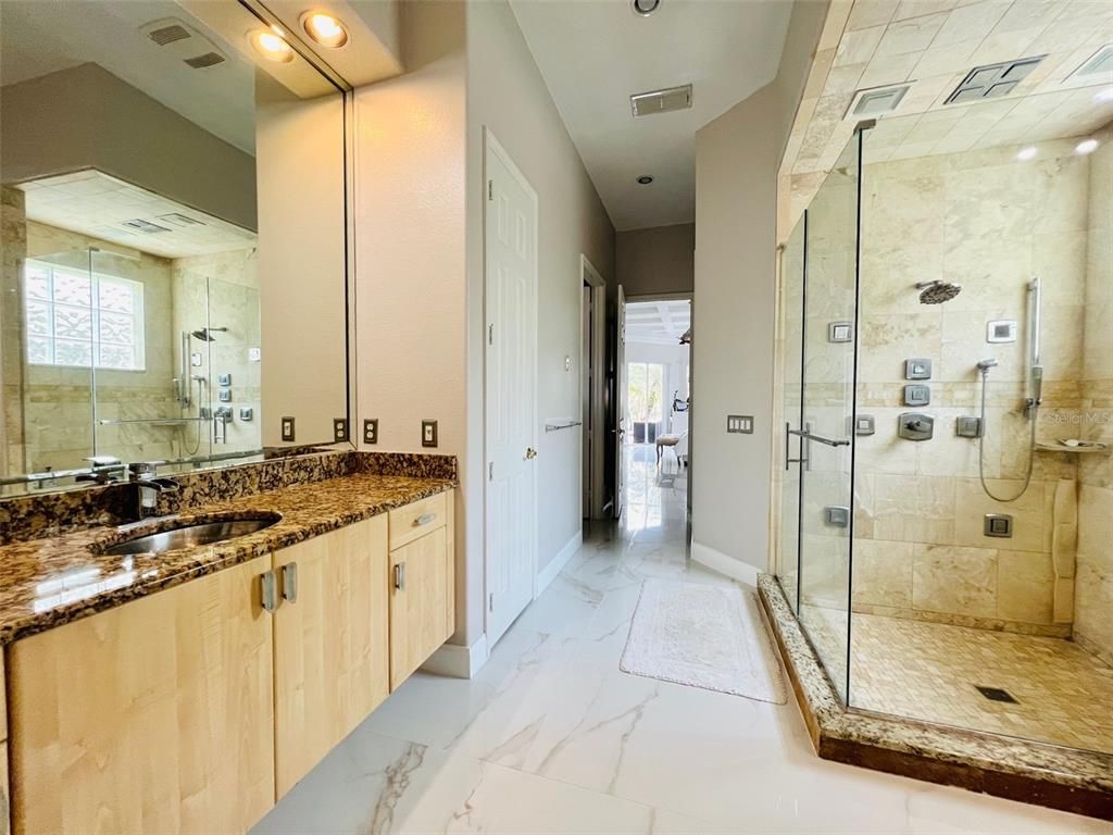 Bathroom, Dual Sink Vanities, Glass Shower, Interior, Marble, Recessed Lighting