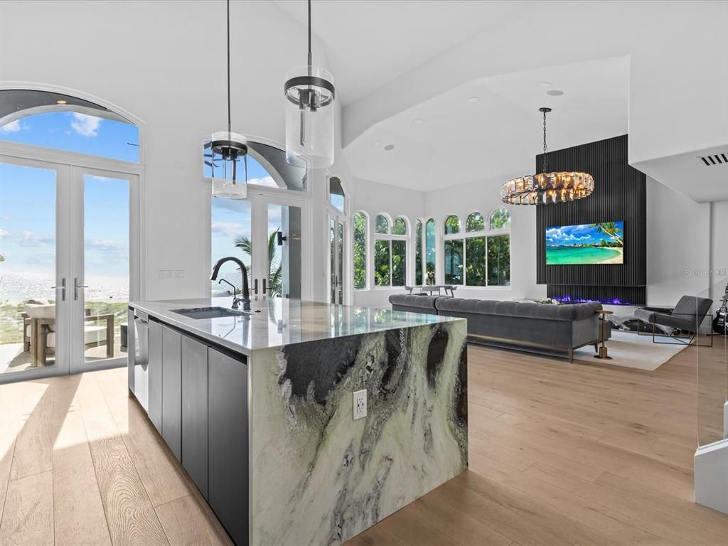 Chandelier, Interior, Kitchen, Living room, Pendant Lights, Recessed Lighting, Water, Wood Texture Flooring