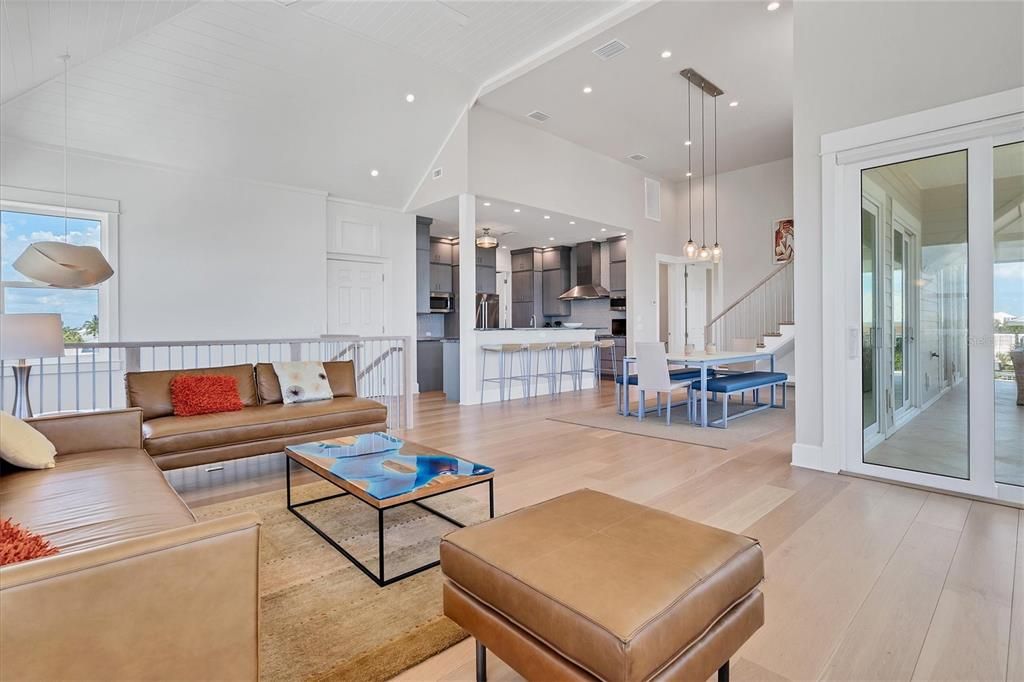 Dining room, Interior, Kitchen, Living room, Pendant Lights, Recessed Lighting, Stainless Steel Appliances, Wood Texture Flooring