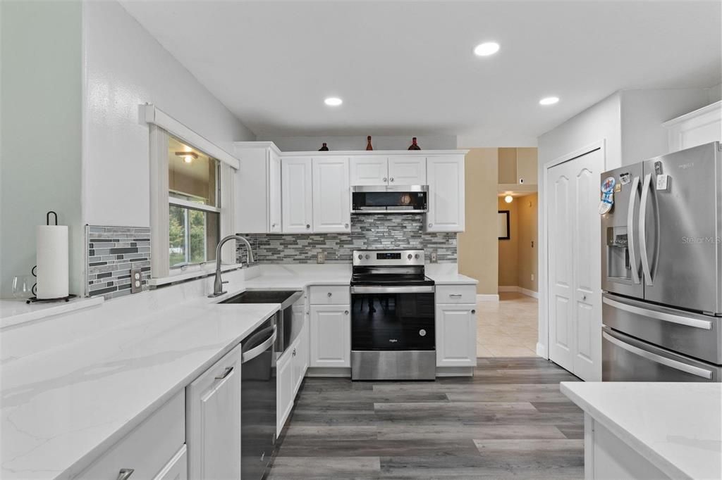 Interior, Kitchen, Recessed Lighting, Stainless Steel Appliances, Wood Texture Flooring