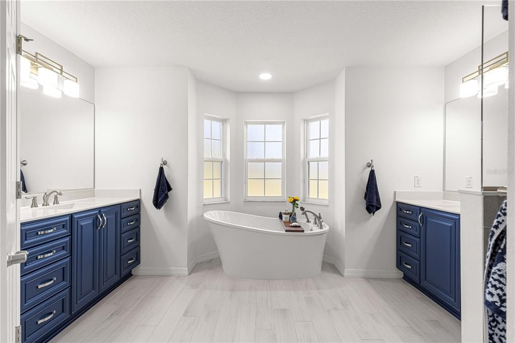 Bathroom, Dual Sink Vanities, Free Standing Baths, Interior, Recessed Lighting, Wood Texture Flooring