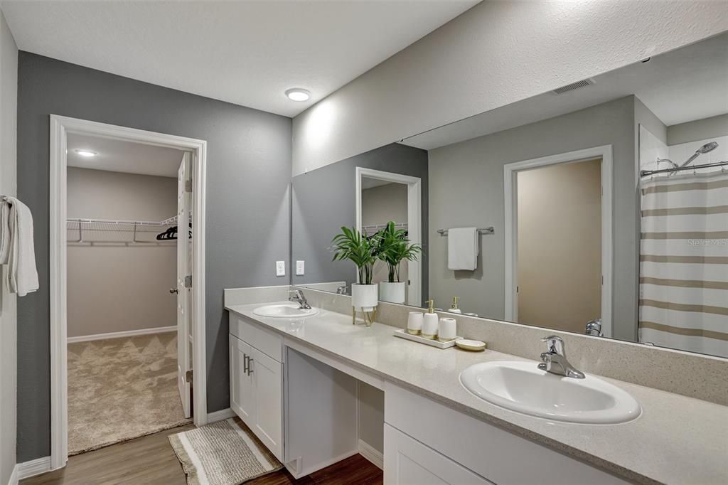 Bathroom, Dual Sink Vanities, Interior, Recessed Lighting, Walk-in Closets, Wood Texture Flooring