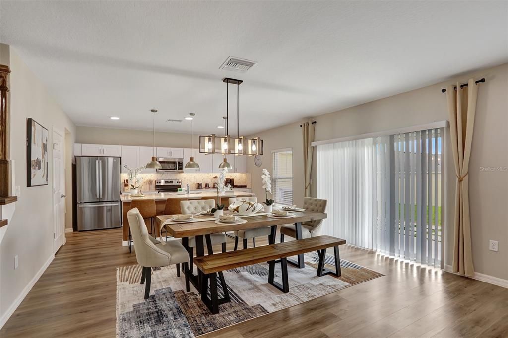 Dining room, Interior, Kitchen, Pendant Lights, Recessed Lighting, Stainless Steel Appliances, Wood Texture Flooring