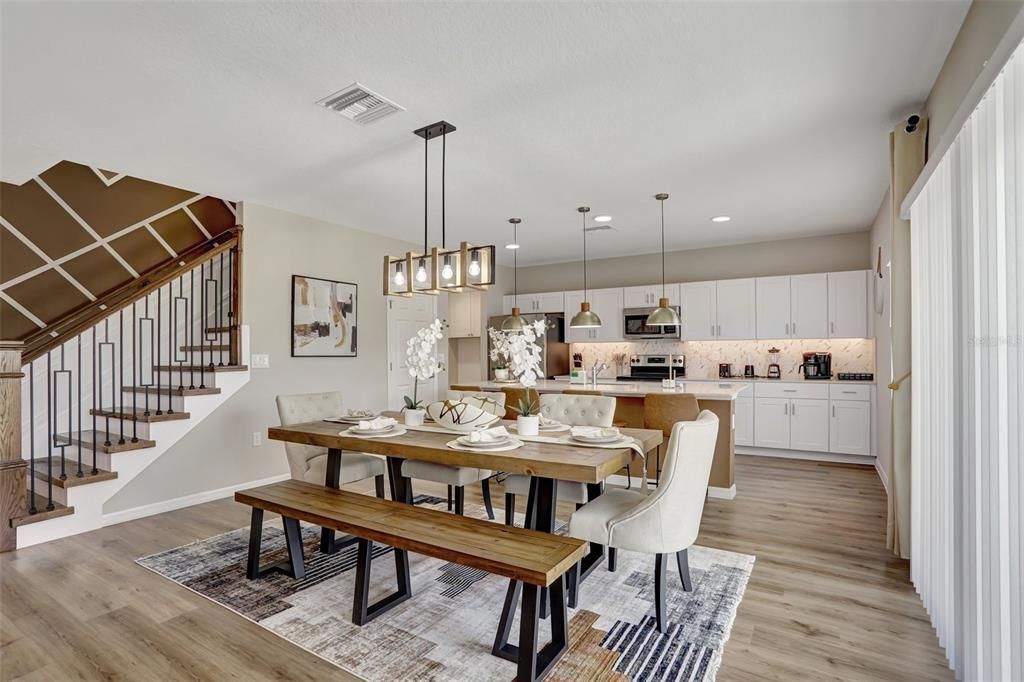 Dining room, Interior, Kitchen, Pendant Lights, Recessed Lighting, Stainless Steel Appliances, Wood Texture Flooring