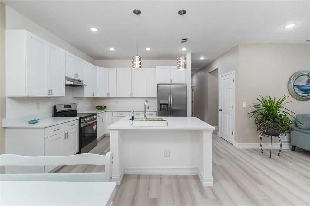 Interior, Kitchen, Pendant Lights, Recessed Lighting, Stainless Steel Appliances, Wood Texture Flooring