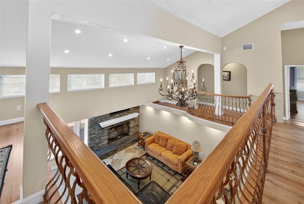 Chandelier, Dining room, Fireplace, Interior, Living room, Recessed Lighting, Wood Texture Flooring