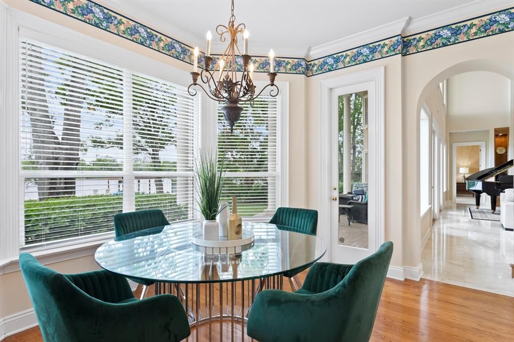 Chandelier, Dining room, Interior, Piano, Wood Texture Flooring
