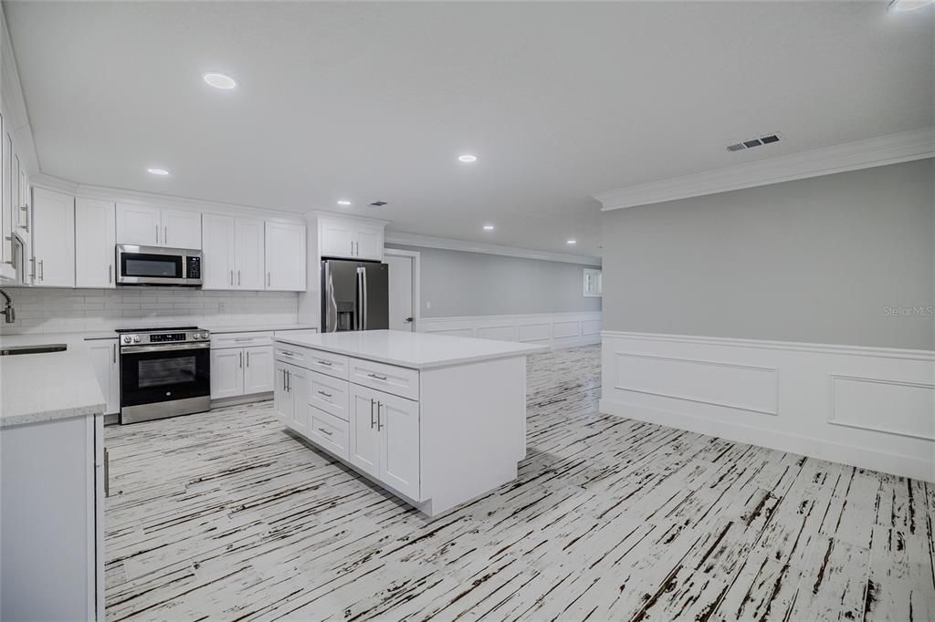 Interior, Kitchen, Recessed Lighting, Stainless Steel Appliances, Wood Texture Flooring