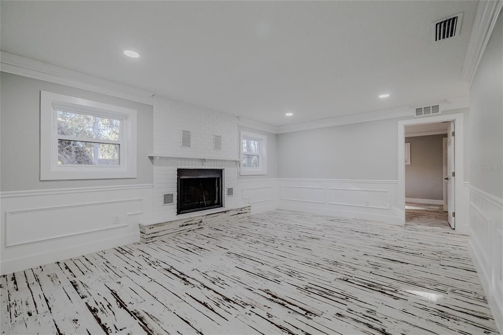 Empty room, Fireplace, Interior, Recessed Lighting, Wood Texture Flooring