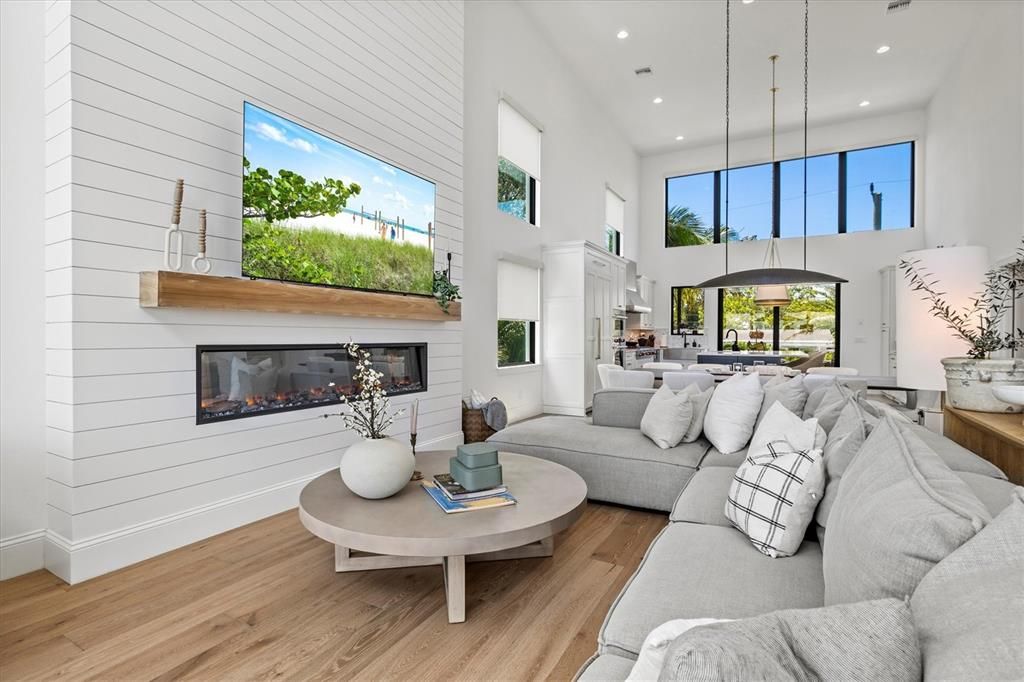 Dining room, Fireplace, Interior, Living room, Pendant Lights, Recessed Lighting, Wood Texture Flooring