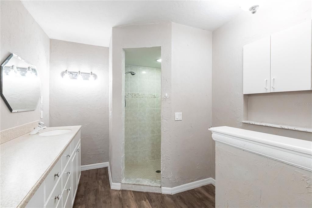 Bathroom, Glass Shower, Interior, Recessed Lighting, Wood Texture Flooring