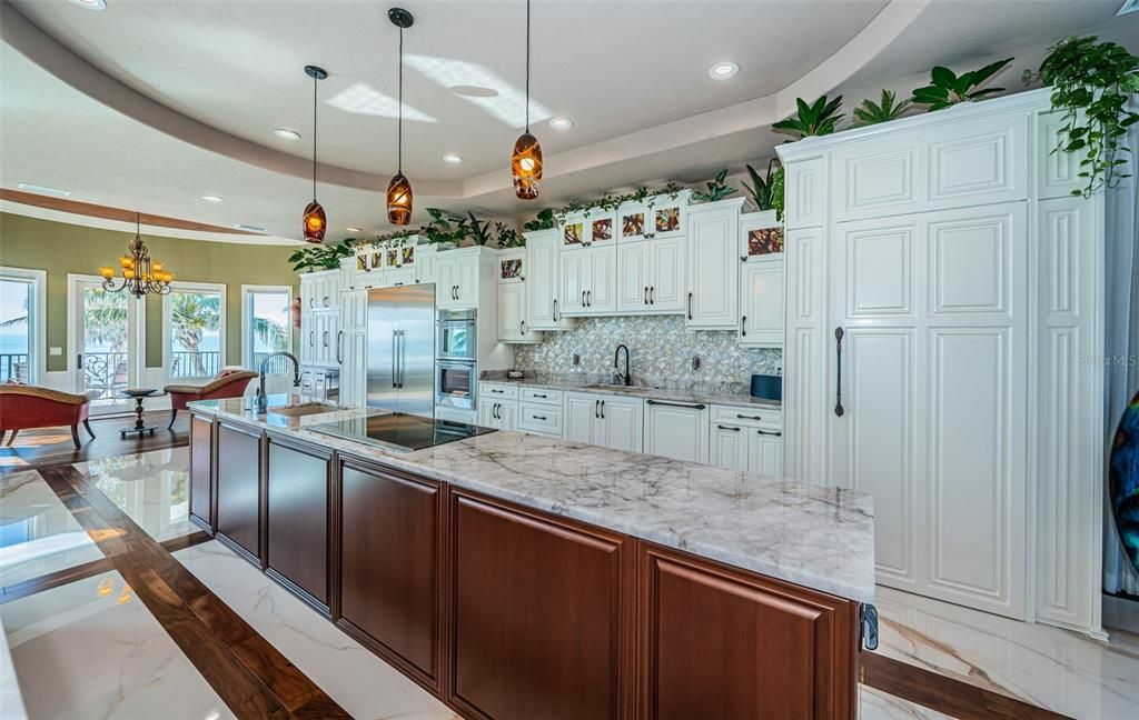 Chandelier, Dining room, Interior, Kitchen, Marble, Pendant Lights, Recessed Lighting, Stainless Steel Appliances
