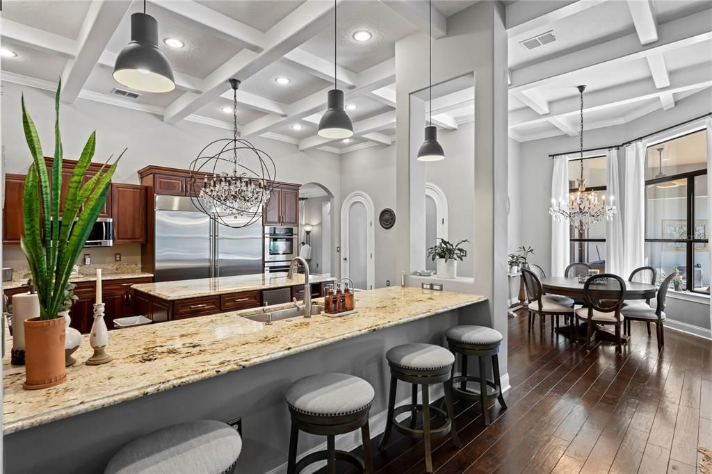 Chandelier, Dining room, Interior, Kitchen, Pendant Lights, Recessed Lighting, Stainless Steel Appliances, Wood Texture Flooring