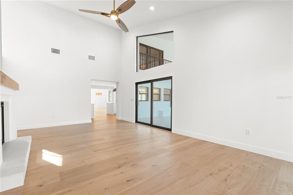 Empty room, Fireplace, Interior, Recessed Lighting, Wood Texture Flooring