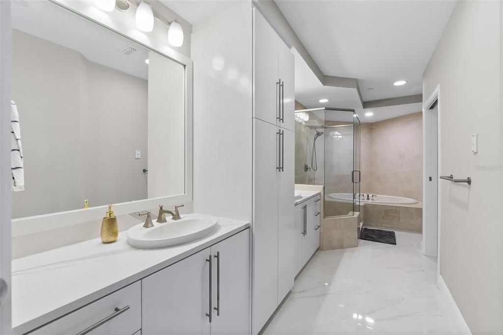 Bathroom, Dual Sink Vanities, Glass Shower, Interior, Marble, Recessed Lighting