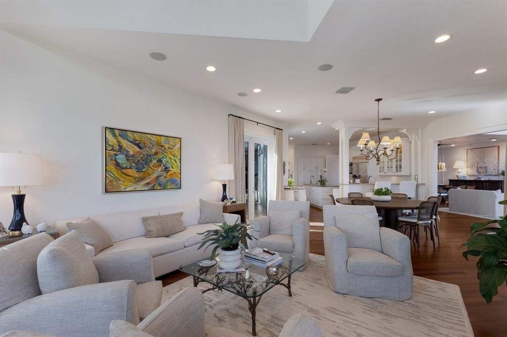 Chandelier, Dining room, Interior, Kitchen, Living room, Pendant Lights, Recessed Lighting, Wood Texture Flooring