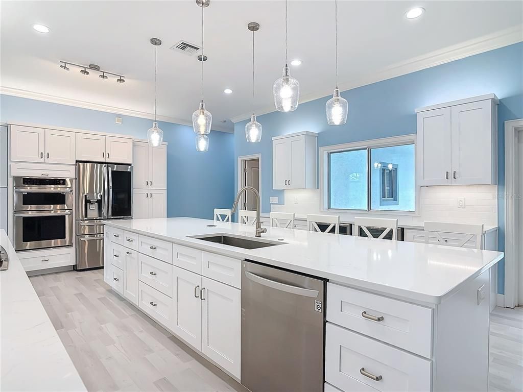 Interior, Kitchen, Pendant Lights, Recessed Lighting, Stainless Steel Appliances, Wood Texture Flooring