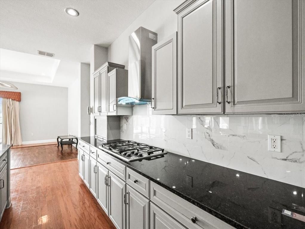Interior, Kitchen, Marble Walls, Recessed Lighting, Wood Texture Flooring