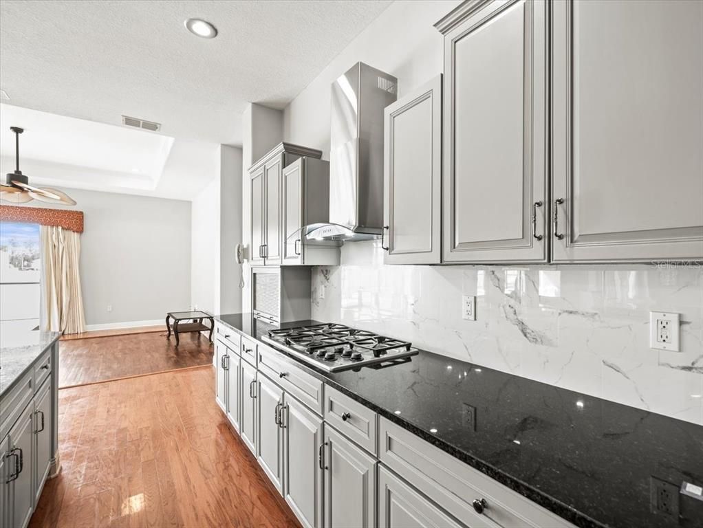 Interior, Kitchen, Marble Walls, Recessed Lighting, Wood Texture Flooring