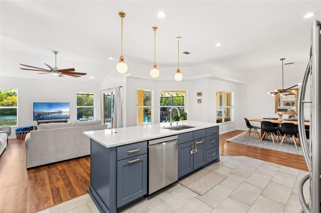 Dining room, Interior, Kitchen, Living room, Pendant Lights, Recessed Lighting, Stainless Steel Appliances, Wood Texture Flooring