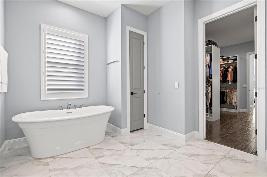 Bathroom, Free Standing Baths, Interior, Marble, Walk-in Closets, Wood Texture Flooring