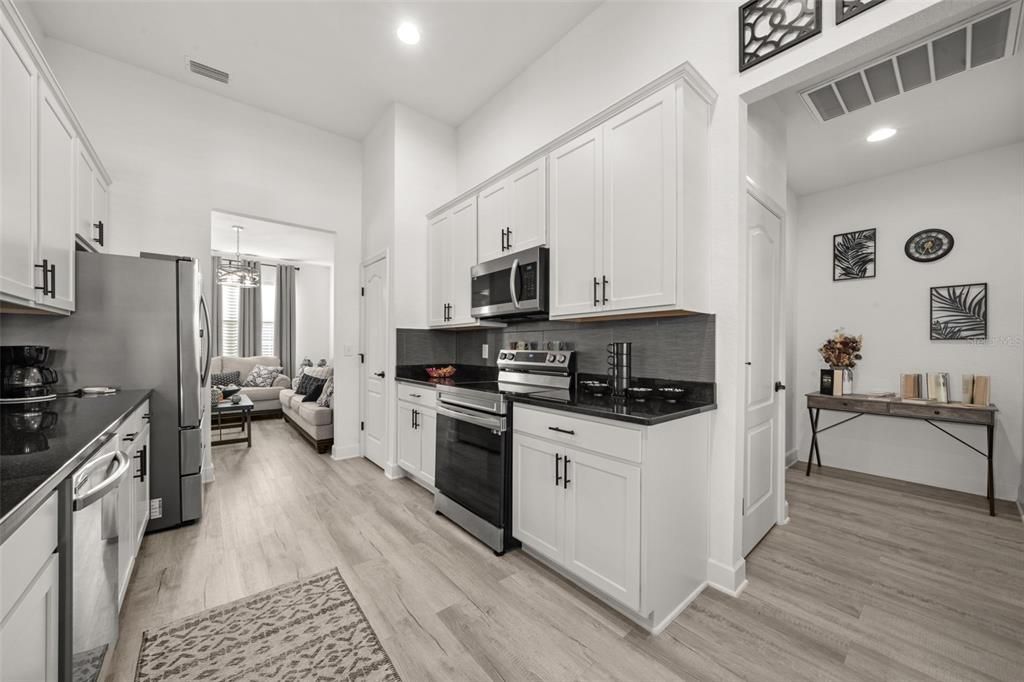 Interior, Kitchen, Pendant Lights, Recessed Lighting, Stainless Steel Appliances, Wood Texture Flooring