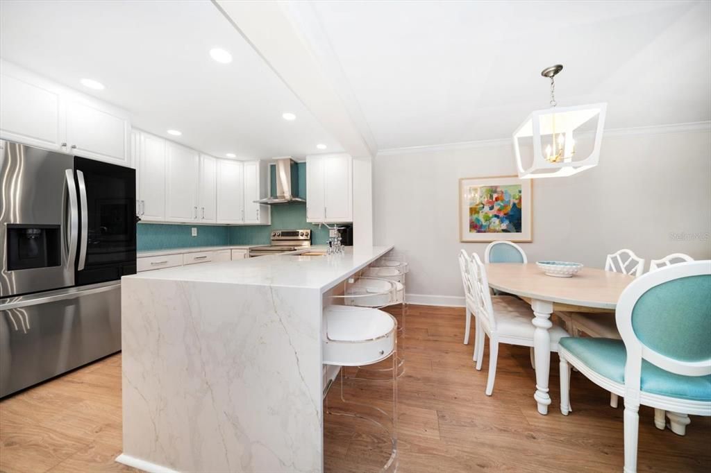 Dining room, Interior, Kitchen, Pendant Lights, Recessed Lighting, Stainless Steel Appliances, Wood Texture Flooring