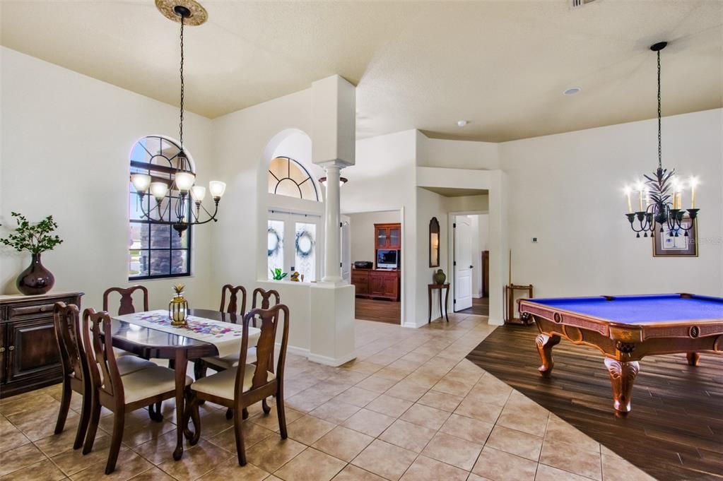 Billiard Table, Chandelier, Dining room, Game Room, Interior, Pendant Lights, Wood Texture Flooring