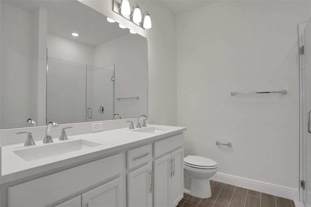 Bathroom, Dual Sink Vanities, Interior, Recessed Lighting, Wood Texture Flooring